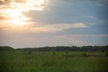 scenery field away which landed a small planeの写真素材