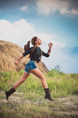 woman at the hayの写真素材