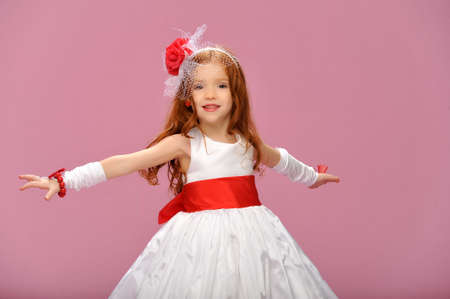 beautiful little girl in a dressの写真素材