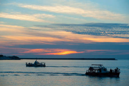 beautiful scenery of the sea on which small ships sailingの写真素材