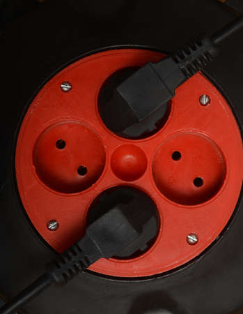 Elektrichnsky extension cetane red with black wires.の写真素材