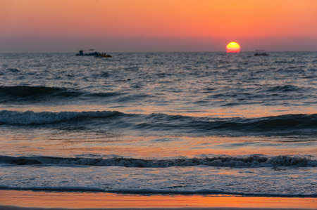 Sunset on the sea in India.の写真素材