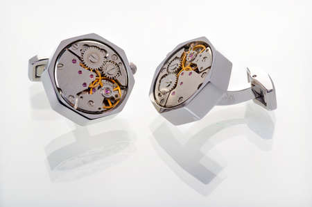 Jewelry, in the form of hours on a neutral white background