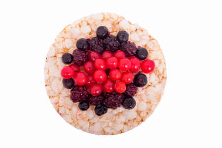 Sandwich of raspberries, blackberries, blueberries on rice breadの写真素材