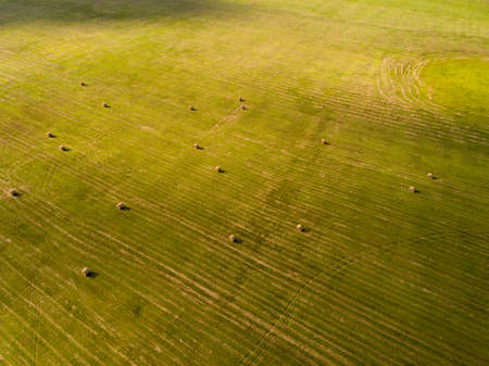 Hey stacks on the field from a bird's eye view