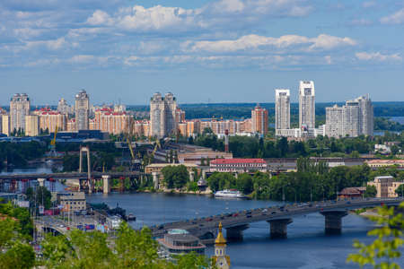 Panorama of Kiev with a view of the Dnieper against the sky.