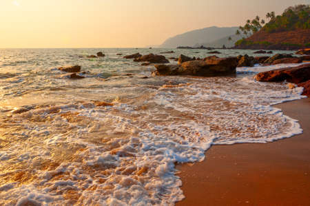 Sunset on the sea beach. Goa India.