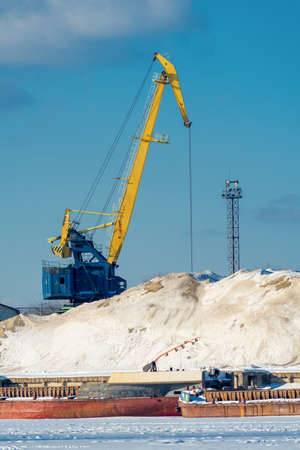 Cargo crane at the port in winter. Kiev.