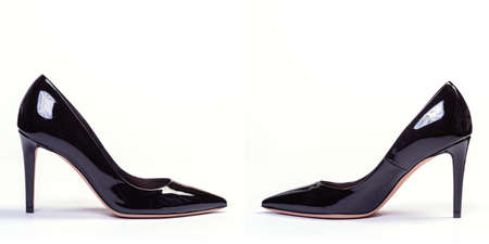 Women's black shoes on a neutral white background.の写真素材