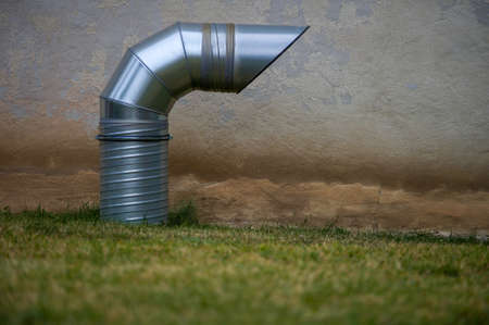 Ventilation pipe outside the building on the street.の写真素材