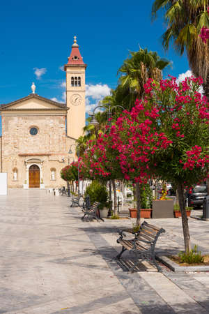 Architecture against the backdrop of flowers and blue sky. Marina di Carrara. Italyの写真素材