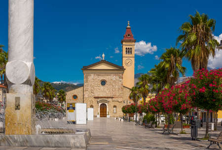 Architecture against the backdrop of flowers and blue sky. Marina di Carrara. Italyの写真素材