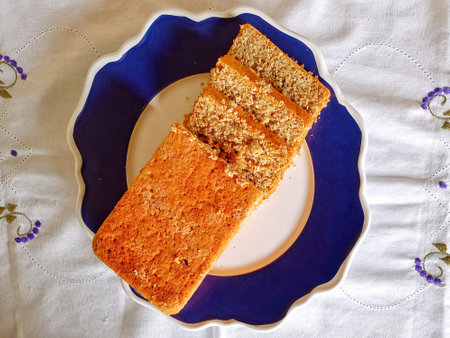 Bread made with oat flakes, sesame seeds, pumpkin seeds, salt, eggs, yeast, butter and natural...