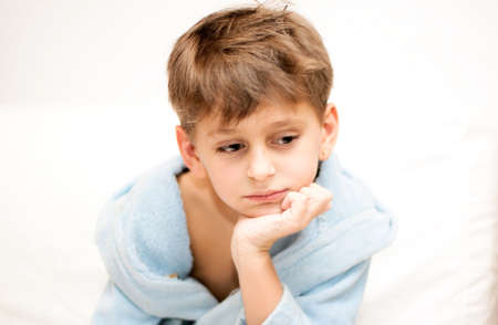 pensive sweet boyの写真素材