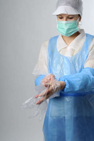worker wearing plastic glovesの写真素材