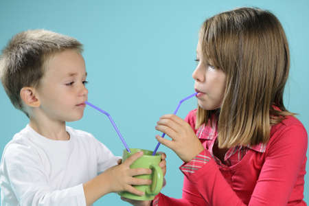 children drinking juiceの写真素材