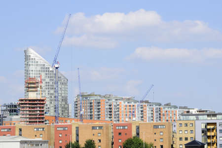 cranes working for construction industryの写真素材