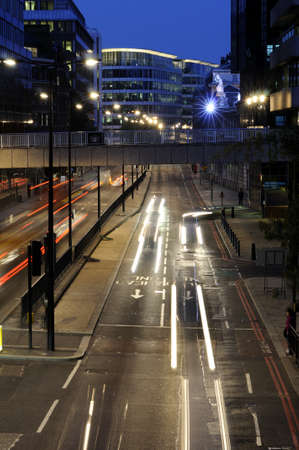 illuminated streets  and traffic in london uk