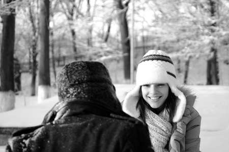 cheerful young woman making conversationの写真素材