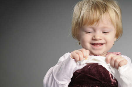 beautiful baby girl playingの写真素材