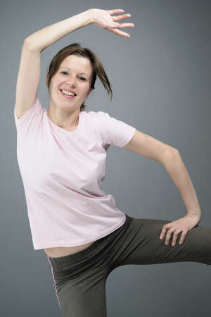 happy aerobic instructor teaching