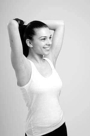 girl practicing fitness exercisesの写真素材