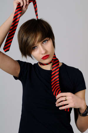 girl arranging accessoryの写真素材
