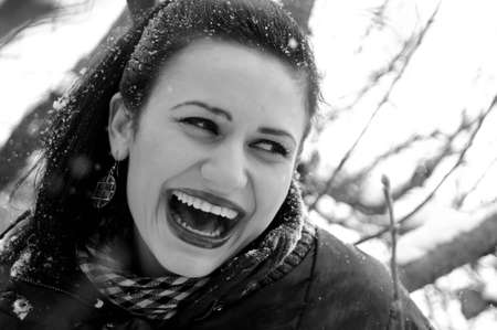 joyful girl laughing in winter