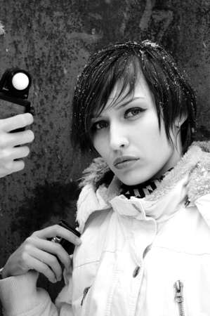 photographer measuring light for photo sessionの写真素材