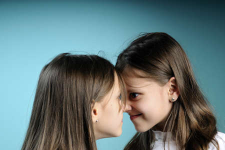 nervous twins arguing and challengingの写真素材