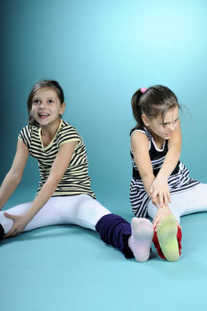 twin girls practicing gym