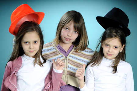 twins playing with accessoriesの写真素材