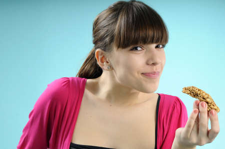 girl eating cereals barの写真素材