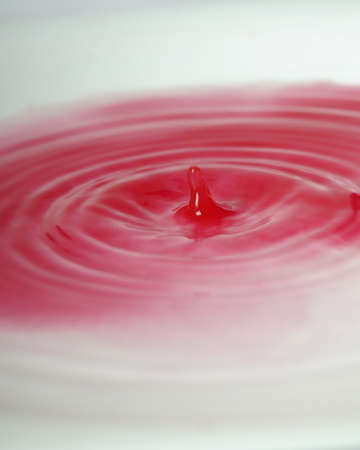 red drop making circlesの写真素材