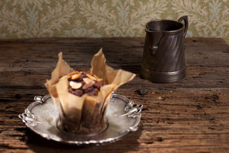 chocolate muffin and cup of tea