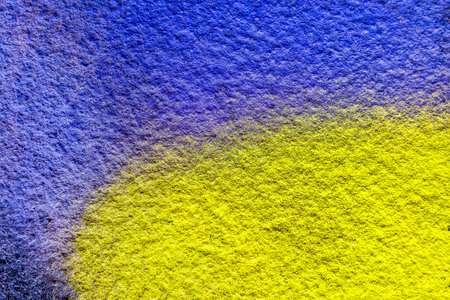 colorful background of graffiti in a city with bright aerosol strips and beautiful colors , urban school wall backdropの写真素材