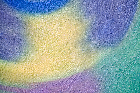 Beautiful bright colorful street art graffiti background. Abstract creative spray drawing fashion colors on the walls of the city. Urban Culture gradient texture, copyspace backdropの写真素材