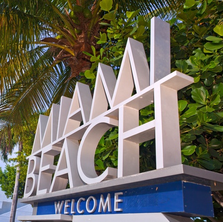 City of Miami Beach Florida welcome sign with palm trees on a sunny summer dayのeditorial素材