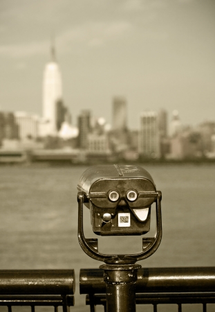 Observation deck with binoculars, view of New York city, Manhattan buildings  Vintage black and white photo の写真素材