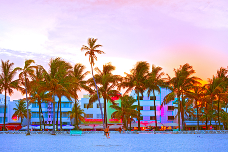 Miami Beach, Florida USA-August 16, 2013:Illuminated hotels and restaurants at sunset on Ocean Drive, world famous destination for nightlife, beautiful weather and pristine beachesのeditorial素材