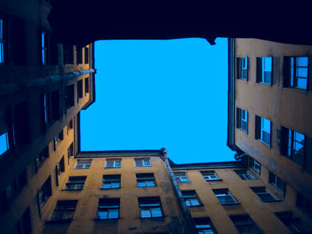 An unusual foreshortening of the walls  multi-storey old house. The house-well in St. Petersburg.の写真素材