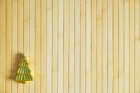 New Year wooden background with toy herringboneの写真素材