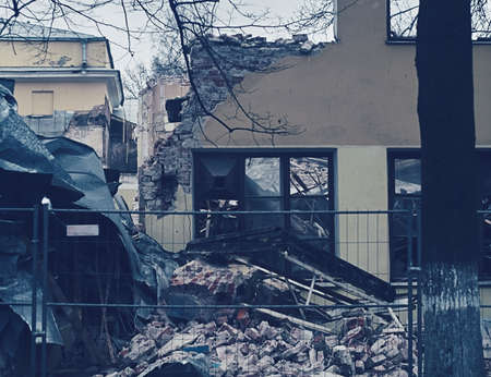 The demolition of building, destruction and ruins, destroyed house, toning photoの写真素材