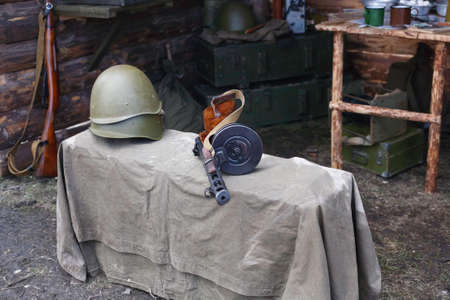 Military helmet and submachine gun Shpagina, reconstruction of life and subjects Soviet army during second world warの写真素材