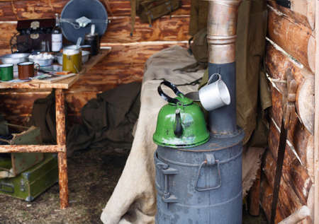 Interior of dugout Soviet soldiers during second world war, items of military life, reconstructionの写真素材