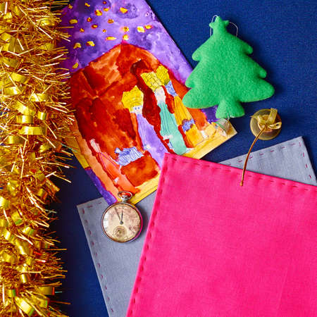 Christmas postcard with child drawn watercolor, top view