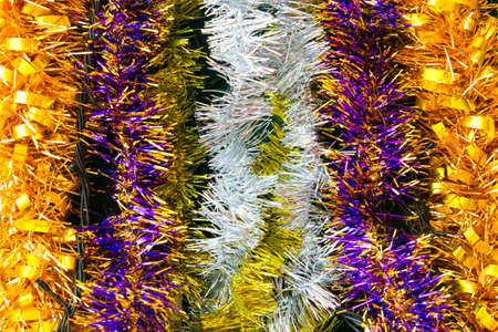 Christmas and New Year tinsel background, colorful tinselの写真素材