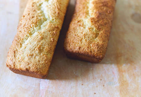 Cakes home-baking on wooden board, bakery table
