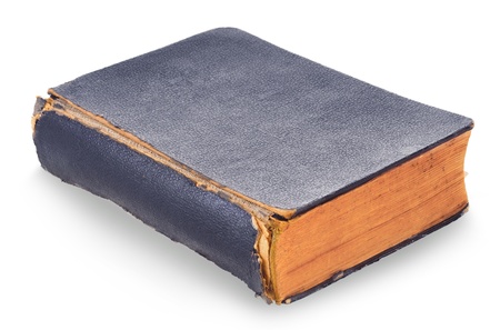 Old closed book on white backgroundの写真素材