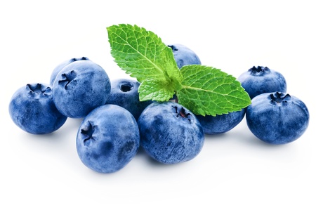 Fresh blueberry with green leafs of mint on white backgroundの写真素材